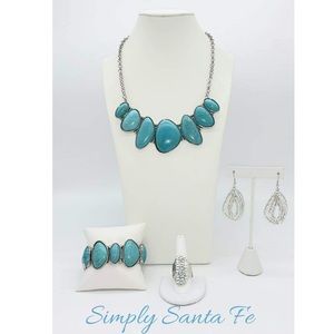 A turquoise jewelry set.
